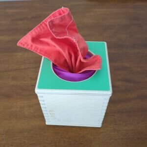 Lovevery baby wood toy from the The Senser Play Kit
Months 5-6